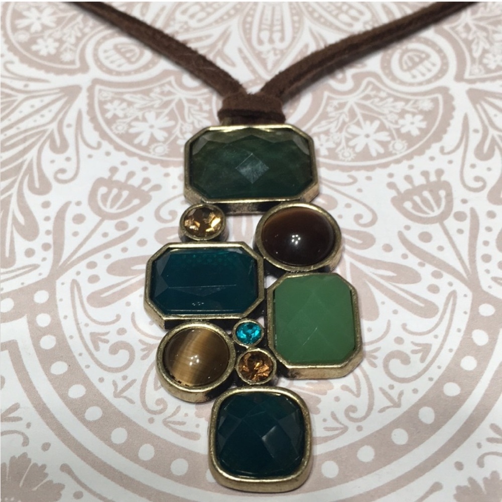 Lia Sophia Multi Stone Necklace on Brown Suede.